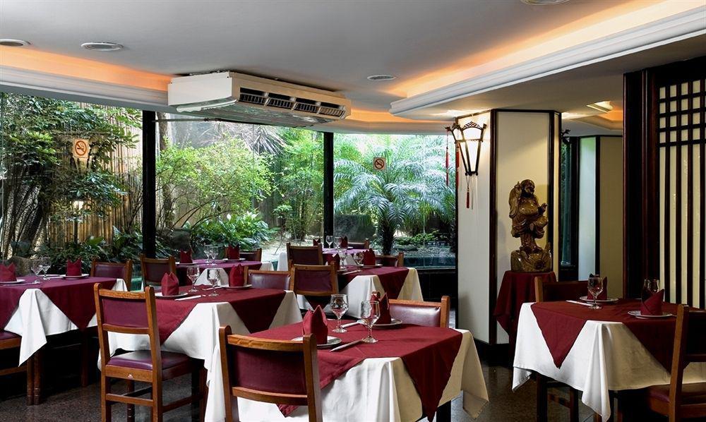 Palmleaf Slim Hotel